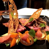 warm pate ciccioli with pickled vegetables, mustard, and crispy pig ears